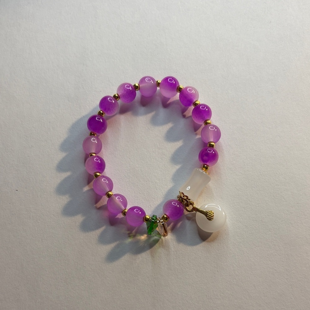 Purple Beaded Bracelet with Charms